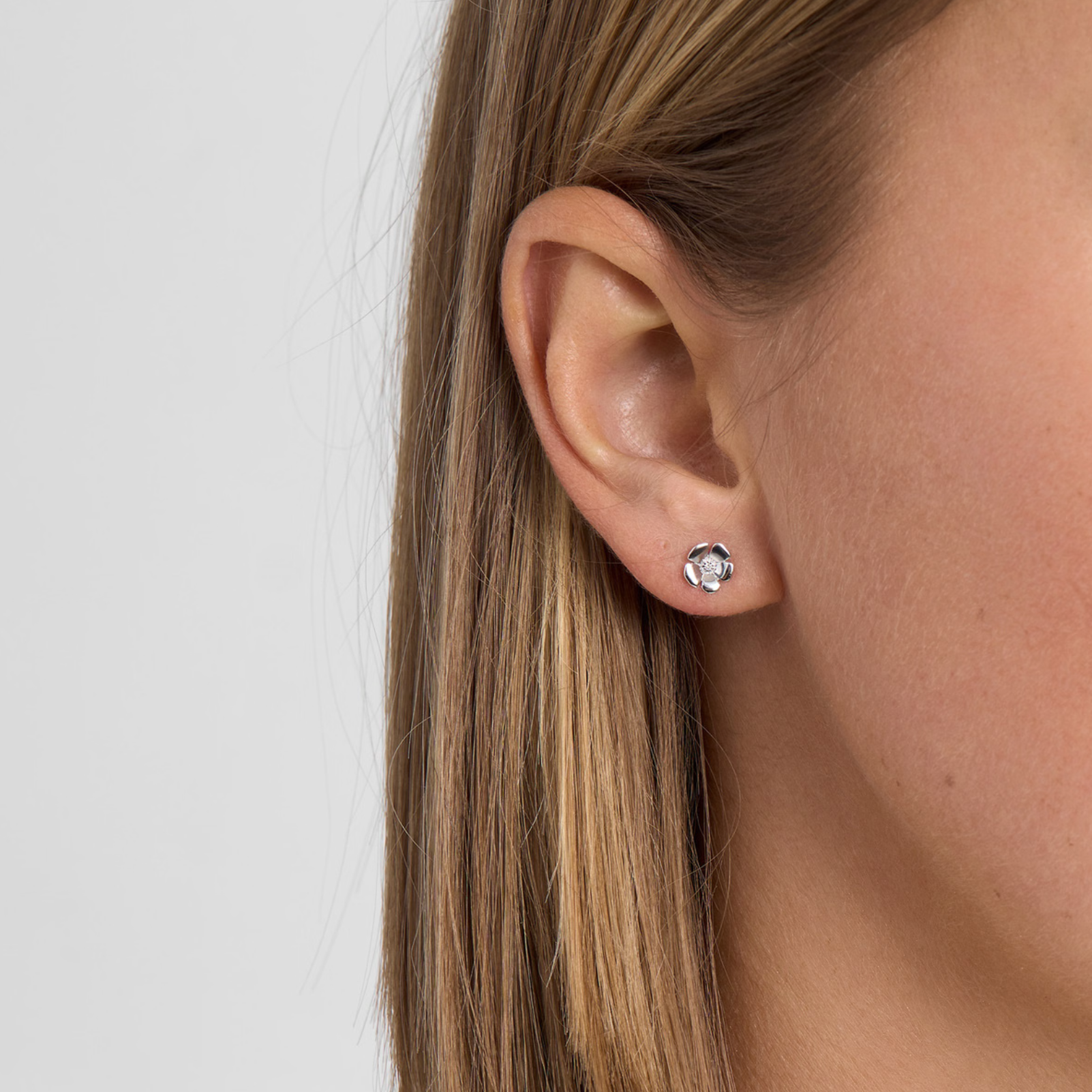 Fleur sølv øreringe med hvide topaser